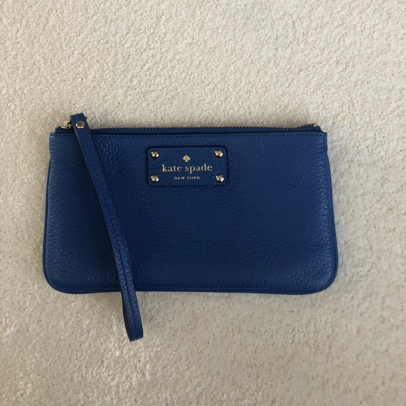 kate spade Handbags - Kate Spade Blue Wristlet with Gold Accents